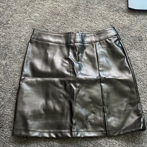 Leather skirt new has never been worn and black from shein